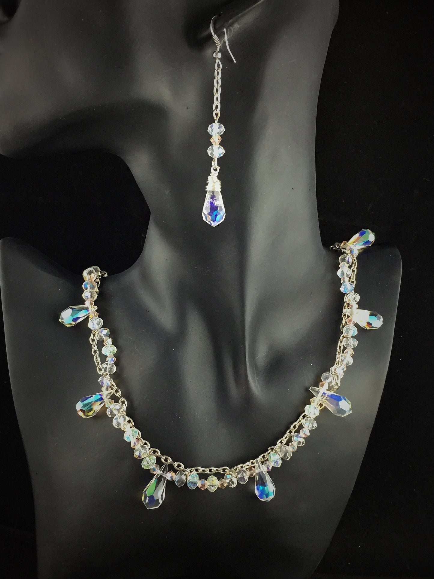 A delicate crystal set that captures light with every movement
