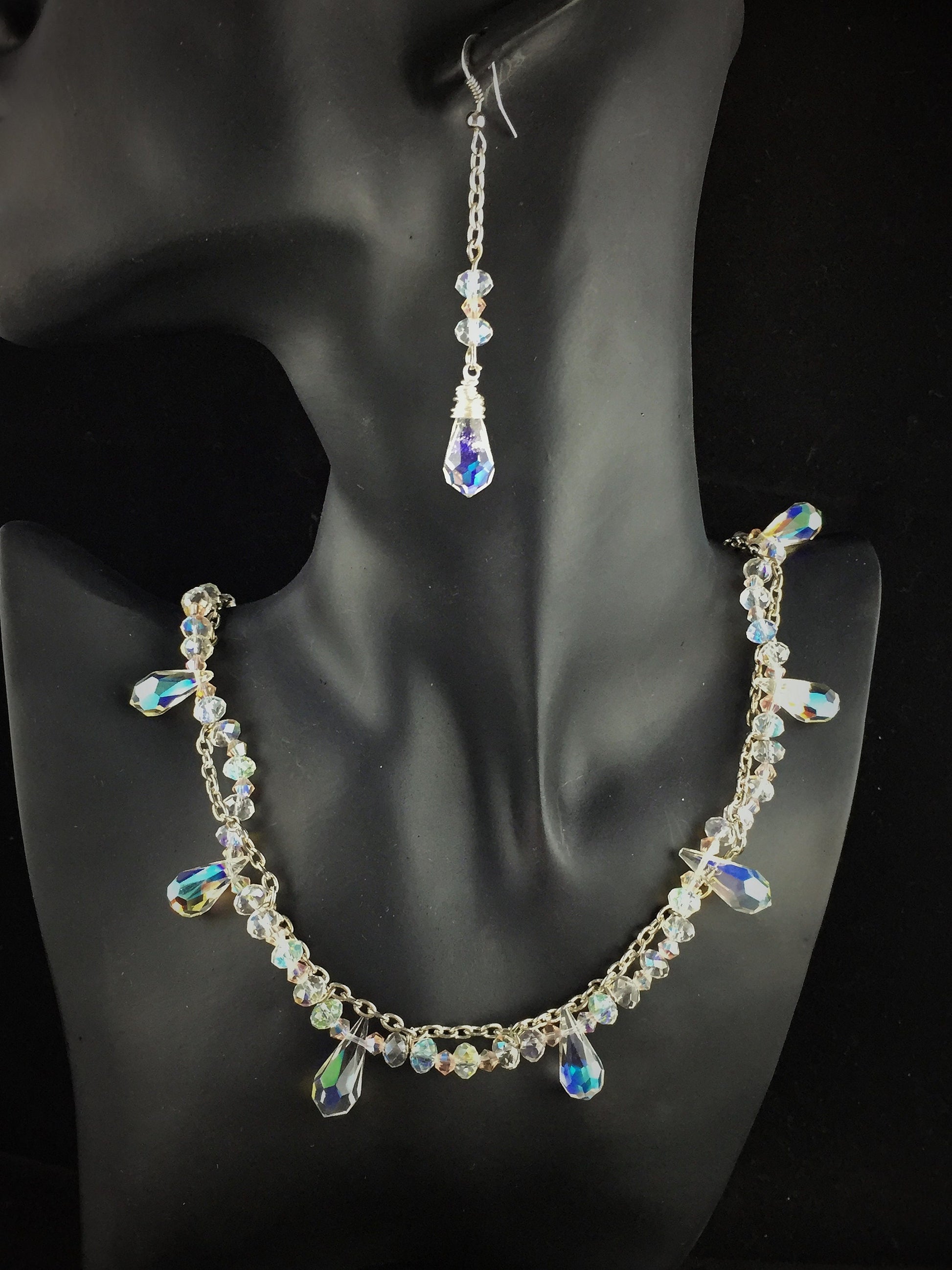 A delicate crystal set that captures light with every movement